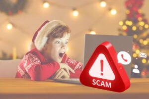 Un bambino al computer, vittima della nuova truffa di Natale, lo smishing