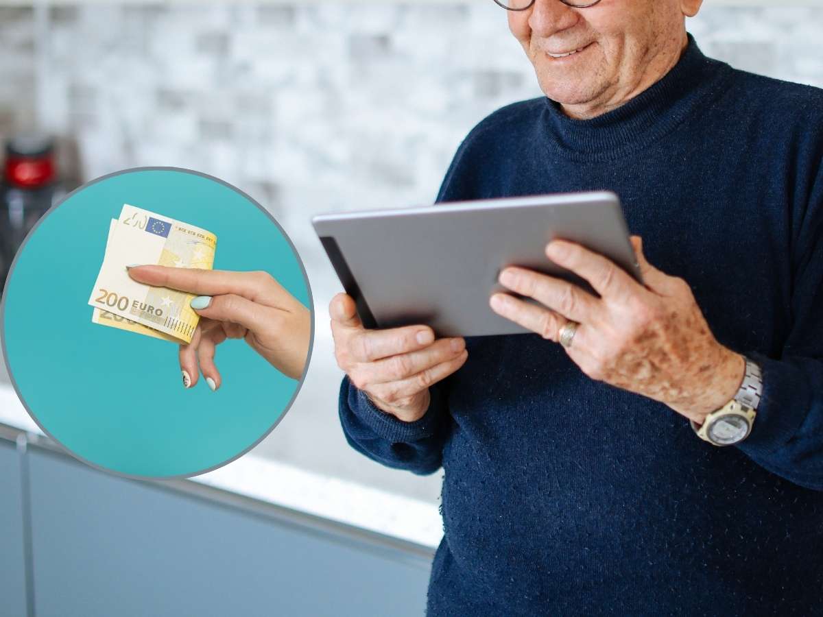 Pensionato tiene in mano tablet euro banconote